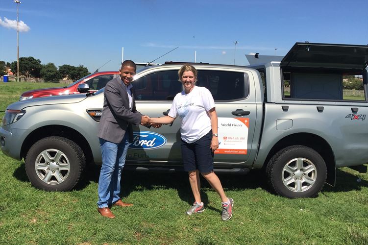 ensly-dooms-from-ford-south-africa-and-paula-barnard-from-world-vision-sa-at-the-official-handover-of-the-ford-rangers-in-soweto-johannesburg_880x500