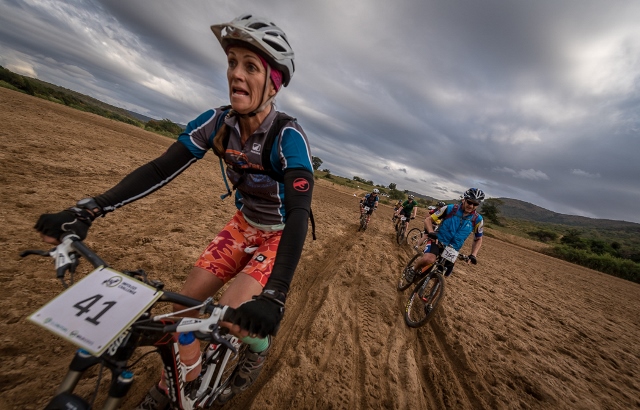 Riders pushing through the sandy White iMfolozi river crossing at the 9.4km mark of the 55km Old Mutual Wild Series iMfolozi MTB over the weekend